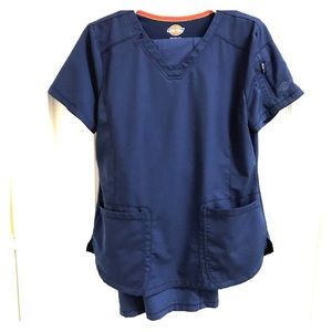 Navy blue stretchy scrubs worn as maternity